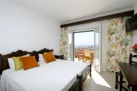 Amigdalies Hotels in Atsiki