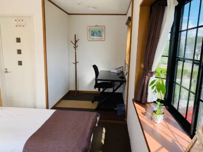 A Comfortable Sun House with Interior Made of Natu Hotels in Tomisato