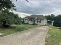 Cozy city cottage, one floor, covered porches, quiet neighborhood