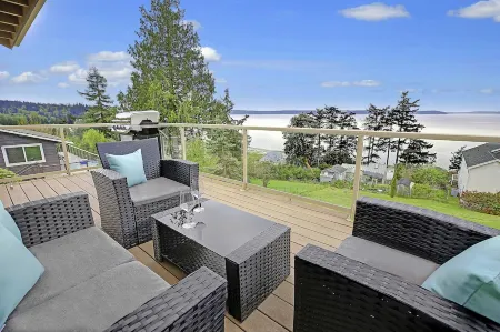 Pristine modern home with sweeping water views