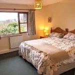Mungo s Well cottage.  Log burner. Conservatory  On 1 level.  3 miles from Kelso