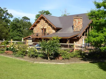 A rustic stone cottage on an estate close to the Texas State Railroad.