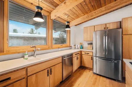 Midcentury home, private beach, large deck with dining