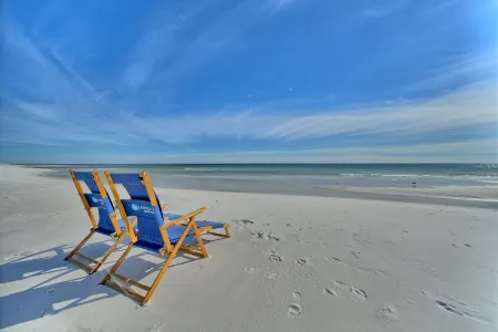 Gated, 80steps to beach & pool, why cross the busy road when you do not have to