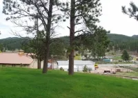 Tin Mill Cottage on a quiet wooded lot, walking distance to downtown!