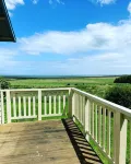 Cottage on orchard acreage with ocean views