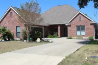 Welcome to The Oasis Pool Haus! Enjoy a private, luxury home with pool. Hotels in Selma