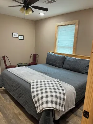 Cabin Bunkhouse with Hot Tub on Private Lake, Fire Pit & Swings in Vian, OK!