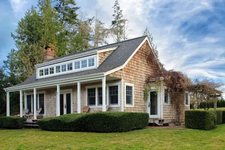 Beautiful Waterfront Cape Cod Style Beach Estate