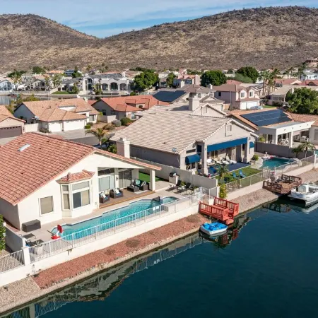 Lakefront Home complete with Mountain Views, Pool, Putting Green & Paddle Boat!