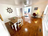 Charming Coastal Cape Cod w/ King Bed, Bikes, & Game Room near Downtown Beach