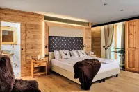 Boutique Hotel e Chalets Salvadori Hôtels à : Commezzadura