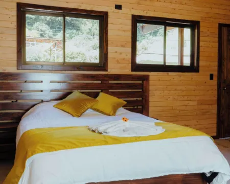 Cabinas El Quetzal Hoteles en Copey