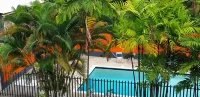 Queen's Comfort Inn Hoteles en Puerto España