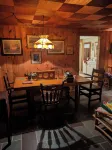 Direct lakefront cottage with wood burning fireplace in great room. Pet friendly