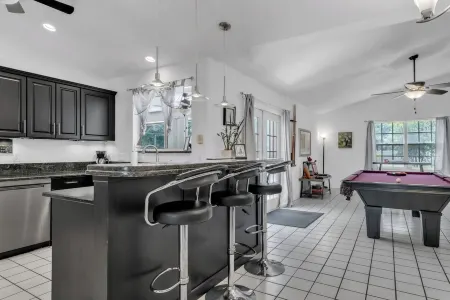 Florida Fun Home with fully fenced, pool backyard and game room