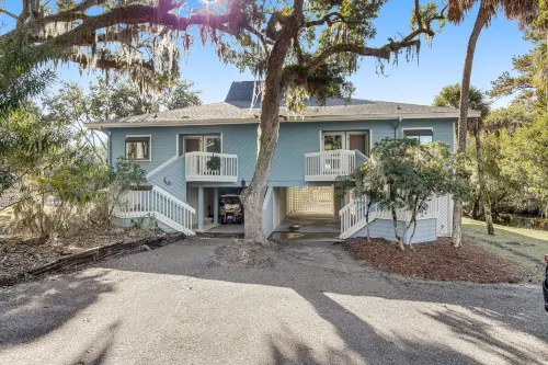 Dog-friendly beach home with screened porch, charming interior, & W/D