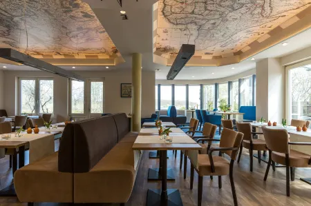 Hotel am Fleesensee Отели в г. Мальхов