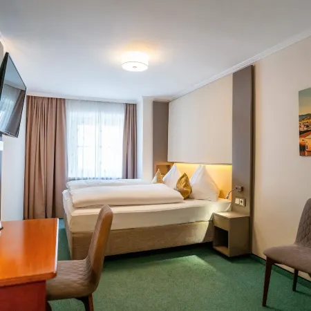 Cityhotel Trumer Stube Отели рядом с достопримечательностью «Шлос Хелльбрунн»