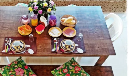 Suítes de Setiba - Hospedaria Oca Ruca Отели в г. Гуарапари