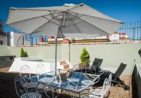 Slow Suites Maestranza Hotels near Parque Don Miguel Mañara