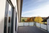 Modern and bright vacation apartment with Hutewald view