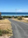 Relax and enjoy the beach air. 2 mins walk to the beach.