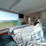 Estudio privado con fogata y vista al mar