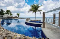 4-Bedroom Oceanfront Condo w/Breathtaking Views! Your Dream Getaway in Cozumel