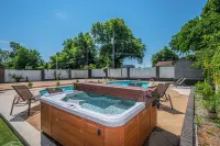 30 Min to OU!  Spacious 5 Bedroom Home with Private Pool and Hot Tub