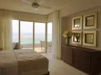 Exceptional Oceanfront Condo at Sierra del Mar Los Arcos Hotels near Youkyung Gallery