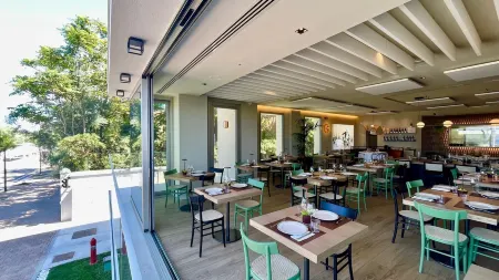 Opera Suite Hotel Pesaro Отели рядом с достопримечательностью «Sfera Grande di Pomodoro»