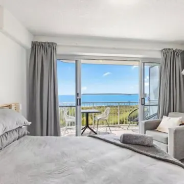 Wake to the Waves - Oceanfront Apartments