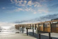 Turtle Cove B • Stylish 2BR Duplex with Extra Half Bath + Walk to Beach