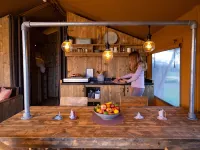Campsite - Combined Tents with Kitchen and Bathroom Located Near a Pond Hotels in Bant