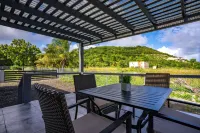 Family-Friendly Charm at Xoop Homes: Ixora Cozy, Convenient, and Close to It All Hotels in Osbourn