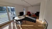Modern, newly built vacation apartment with large covered balcony and view Hotel a Wilnsdorf