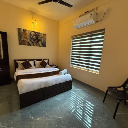 The Family Sport Homestay Wayanad Отели рядом с достопримечательностью «Остров Курува-Двип»
