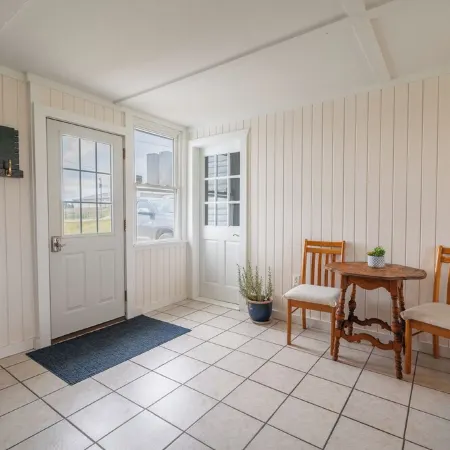 Family owned and operated spacious Farm House with a modern decorative flair.