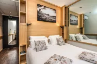 Logis Hôtel Restaurant les 2 Rives - Chambres Climatisees - A75, en Bordure de rivière - Pet friendly