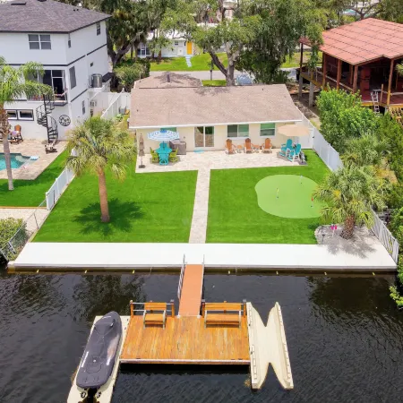 Riverfront Home w/ Putting Green & Boat Dock!