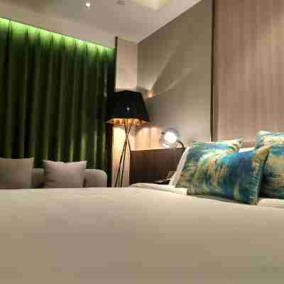 德陽洋洋安伴環保酒店 Rooms