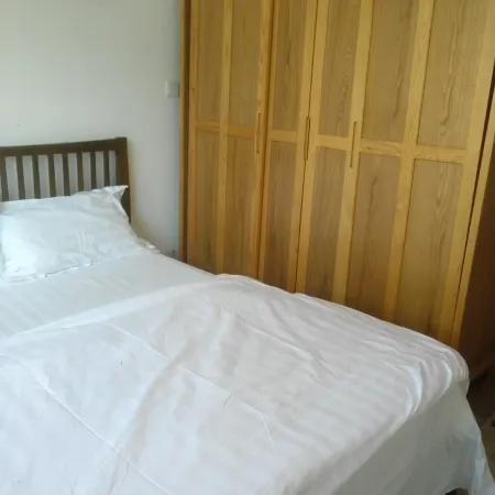 Yiju Xiaojia Apartment (Hanjing Road No.1) Отели рядом с достопримечательностью «Китайская медицинская больница в новом районе западного побережья Циндао»