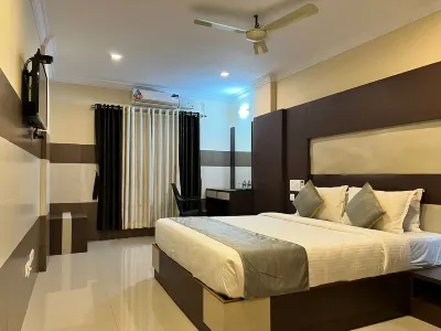 JS Grand Residency Hotels near SRT HOME DECORE