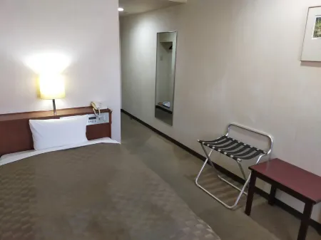 Mizushima Ekimae Business Hotel in Kurashiki Отели в г. Асакути