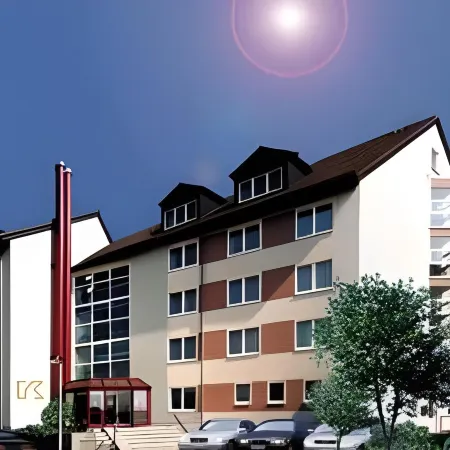 Kempe Komfort Plus Hotel Отели в г. Золинген