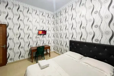 Homestay Rand's Kopi Pandan Syariah Mitra RedDoorz Hotel dekat Vie Cafe & Ferboden Distro
