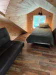 Newly built cabin in cozy wooded setting