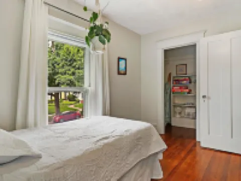 Historic house on tree lined red brick street of historic homes. Hotels in Racine