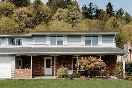 Eye-catching Home and Yard w/ Luxurious Hot Tub, Patio, and Private Trail Access